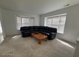 284 Brookfield Drive Jackson, NJ 08527 - Photo 6 of 17 a living room with furniture and a window