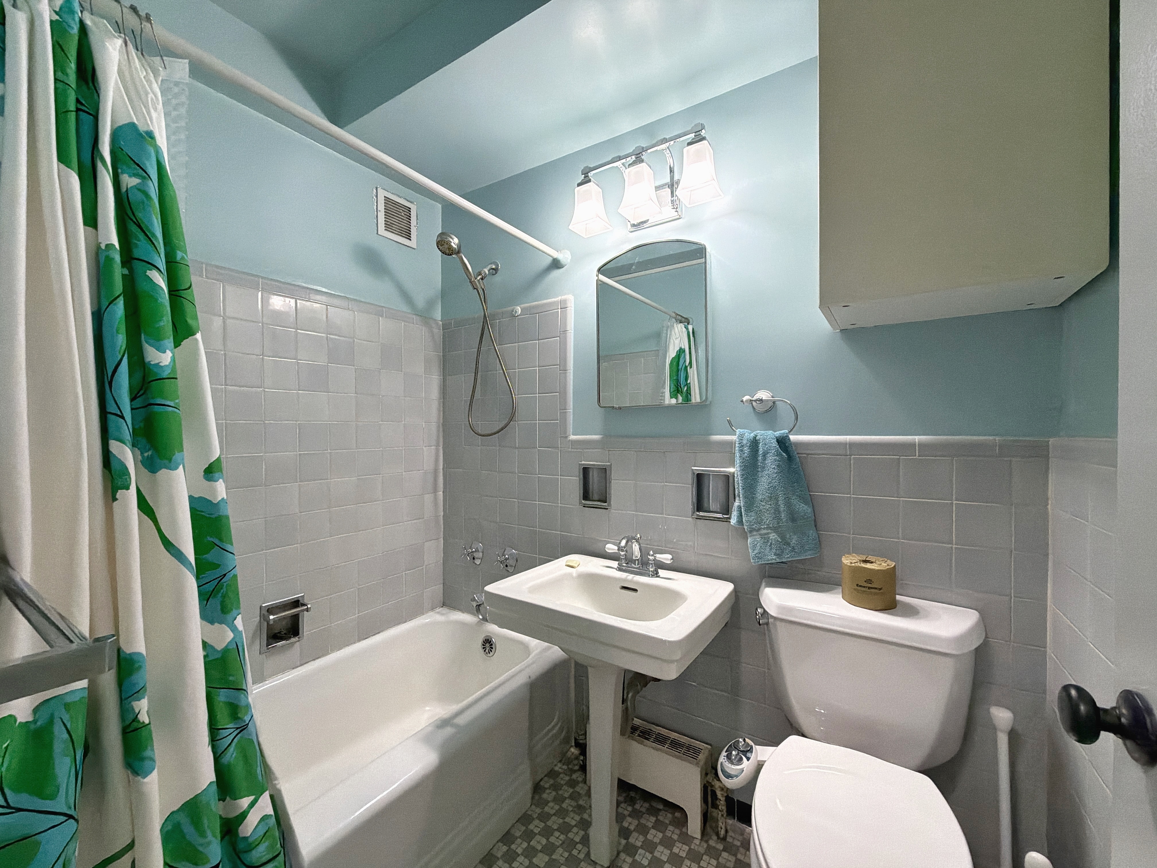 175 Adams Street, Unit 9DE Brooklyn, NY 11201 - Photo 18 of 18 a bathroom with a sink toilet and shower