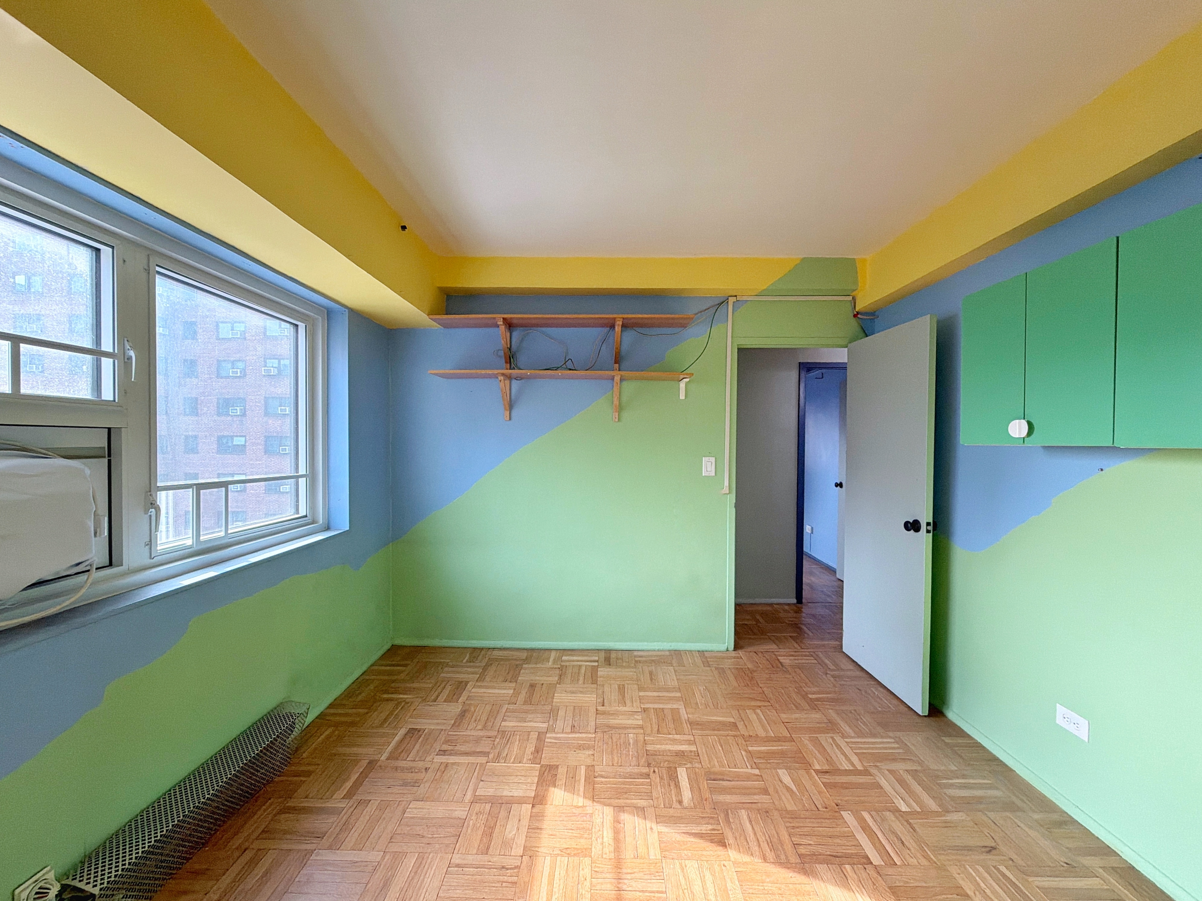 175 Adams Street, Unit 9DE Brooklyn, NY 11201 - Photo 4 of 18 a view of an empty room and window