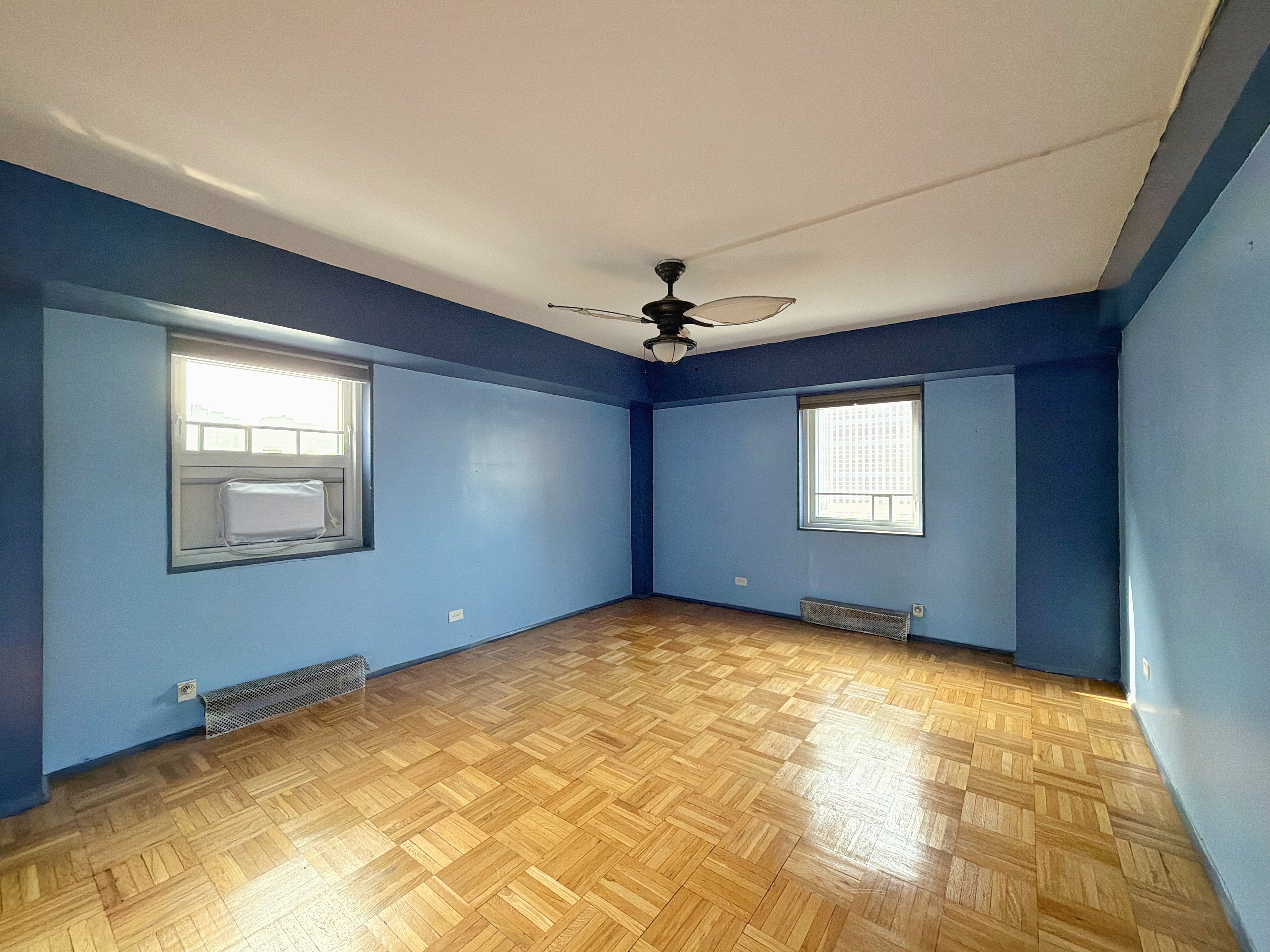 175 Adams Street, Unit 9DE Brooklyn, NY 11201 - Photo 5 of 18 a view of an empty room and window