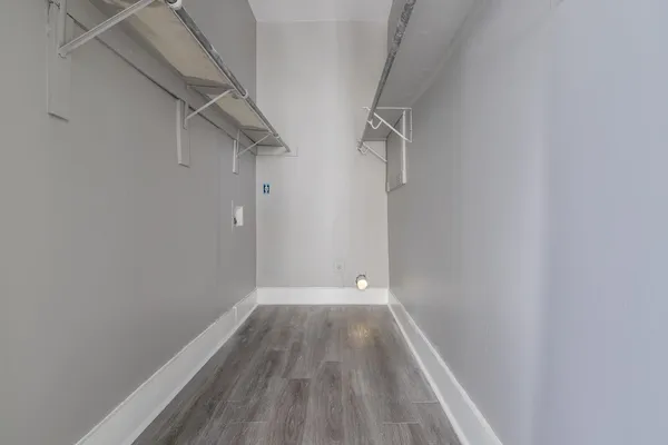 a view of small space with racks on the wall