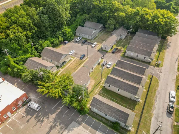 an aerial view of a house with outdoor space