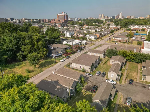 an aerial view of a city with lots of residential buildings
