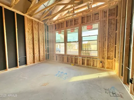 a view of an empty room with windows