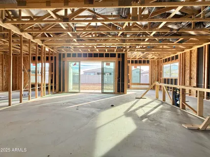 a view of a hall with wooden floor