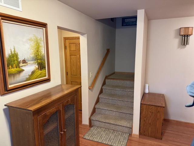 12027 Lisbon Road Newark, IL 60541 - Photo 22 of 29 a view of entryway and hall with wooden floor