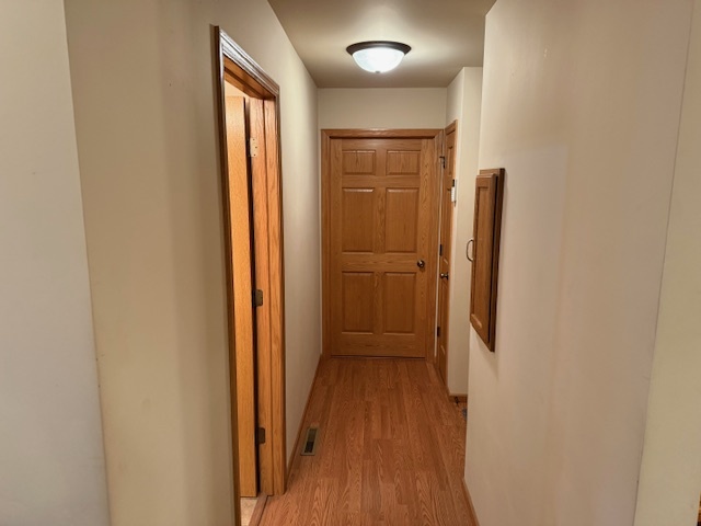 12027 Lisbon Road Newark, IL 60541 - Photo 23 of 29 a view of a hallway with wooden floor