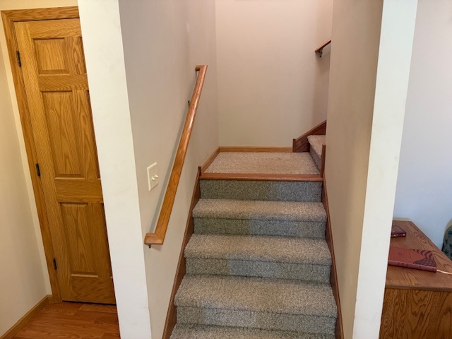 12027 Lisbon Road Newark, IL 60541 - Photo 26 of 29 a view of staircase with white walls and a window
