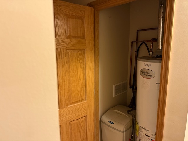 12027 Lisbon Road Newark, IL 60541 - Photo 27 of 29 a bathroom with a sink and washing machine