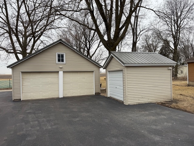 12027 Lisbon Road Newark, IL 60541 - Photo 4 of 29 a view of garage and yard