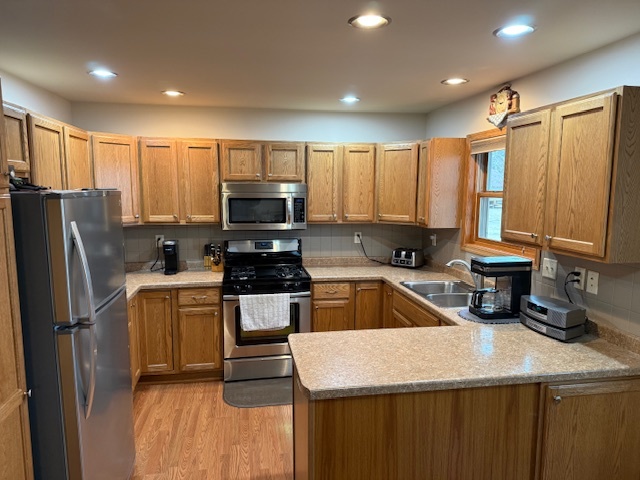 12027 Lisbon Road Newark, IL 60541 - Photo 8 of 29 a kitchen with kitchen island granite countertop a refrigerator stove microwave and sink
