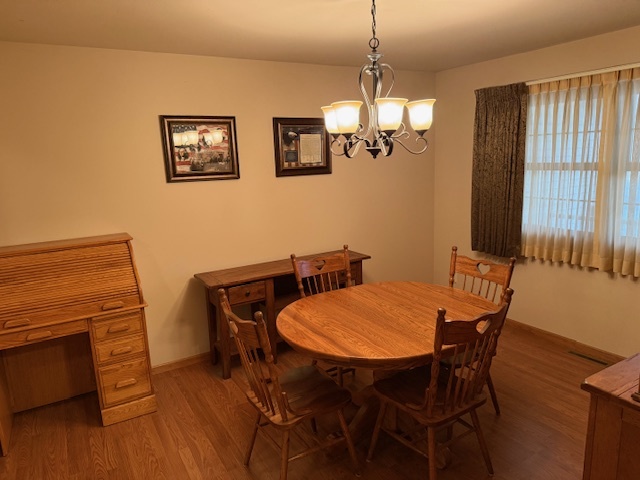 12027 Lisbon Road Newark, IL 60541 - Photo 9 of 29 a view of a dining room with furniture window and wooden floor