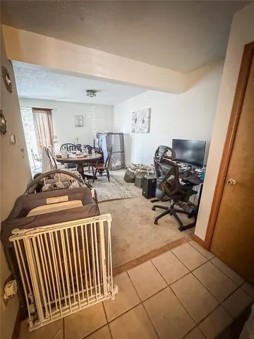 a bedroom with bed and a window