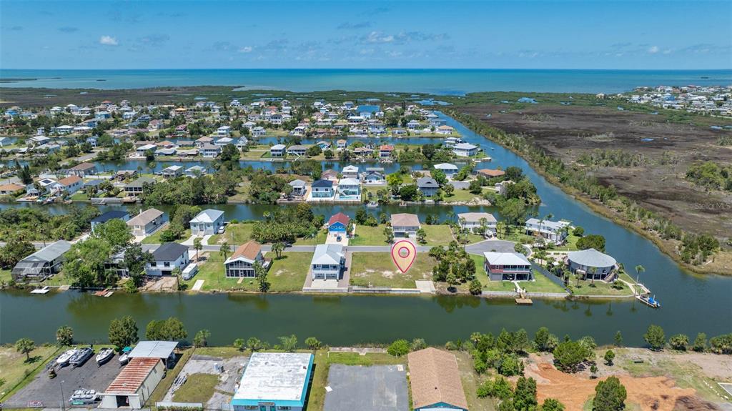 3404 Fernleaf Drive Hernando Beach, FL 34607 - Photo 9 of 11 an aerial view of a houses with outdoor space
