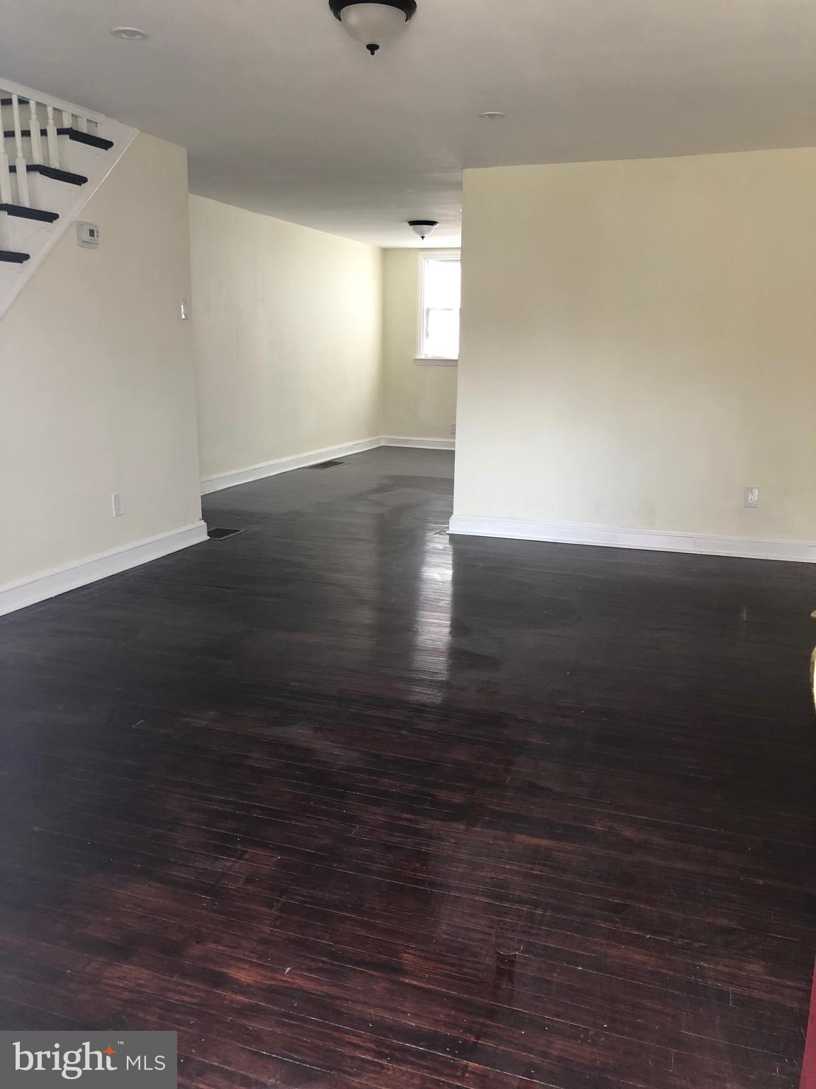 1828 Farrington Road Philadelphia, PA 19151 - Photo 2 of 24 Spacious Living Room with Hardwood Floors