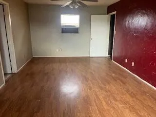 a bathroom with a shower and toilet