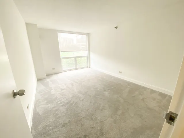 a view of empty room with windows