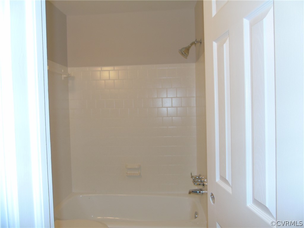 9901 Qualla Road Chesterfield, VA 23832 - Photo 21 of 38 Hall tub and shower, New toilet, vanity and sink.