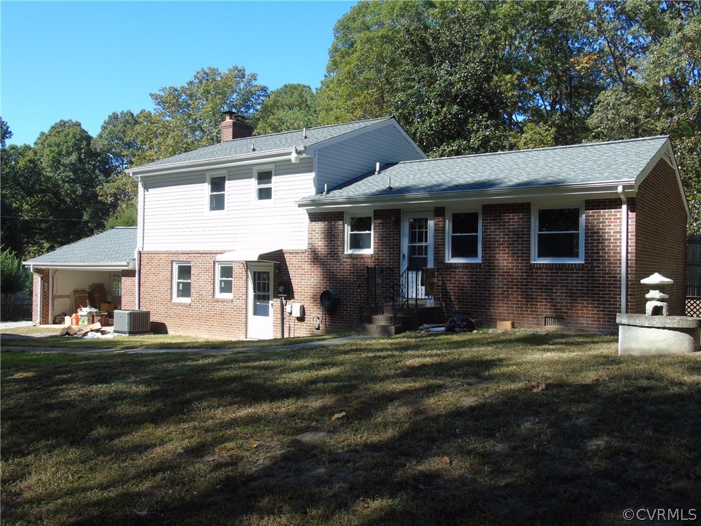 9901 Qualla Road Chesterfield, VA 23832 - Photo 30 of 38 Rear View, Attached Garage, Fireplace with wood st