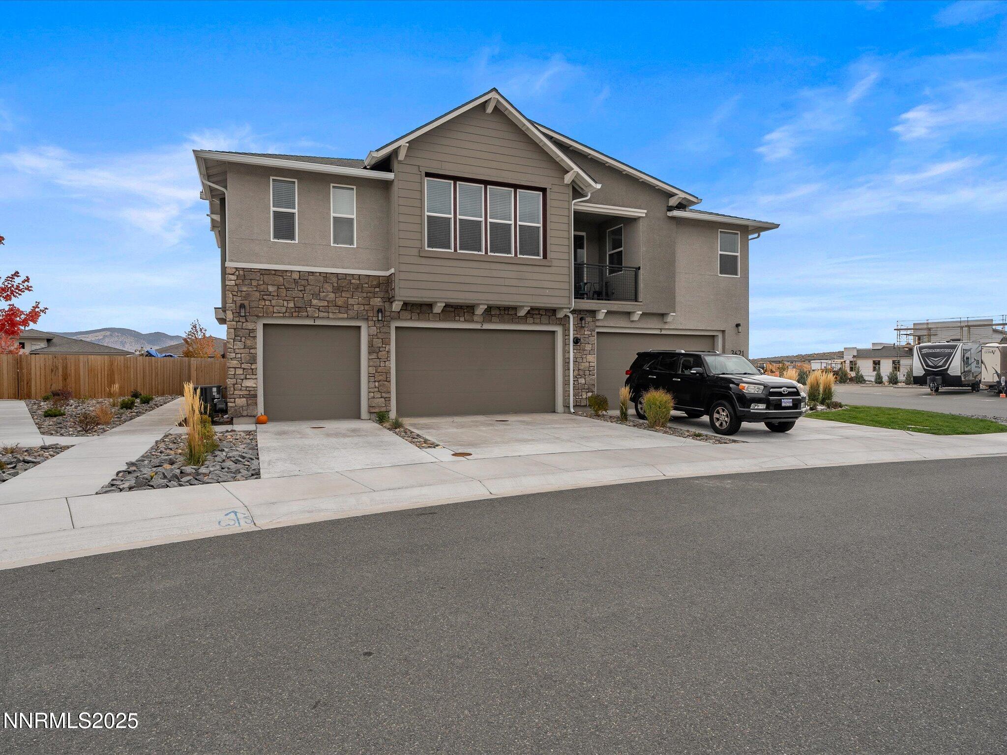 3621 Pulsar Lane, Unit 2 Carson City, NV 89705 - Photo 2 of 31 a view of a house with a outdoor space