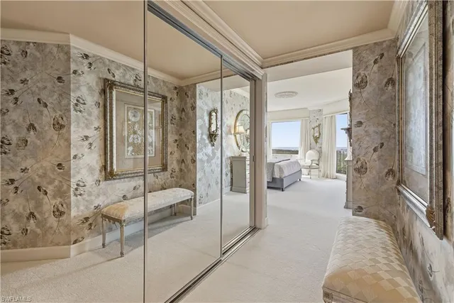 a view of a swimming pool with chairs