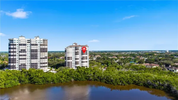 a building with river in front of it