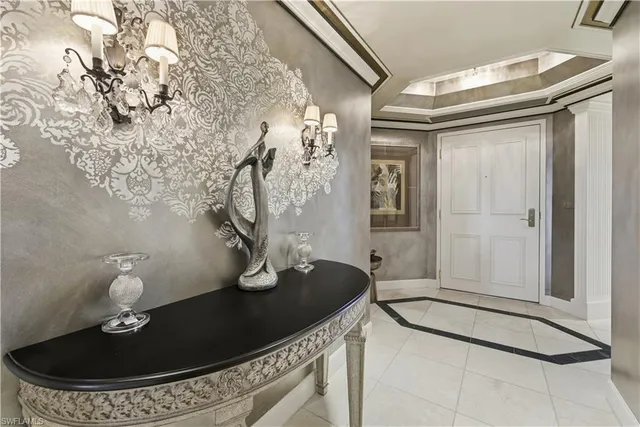 a kitchen with cabinets a sink and white appliances