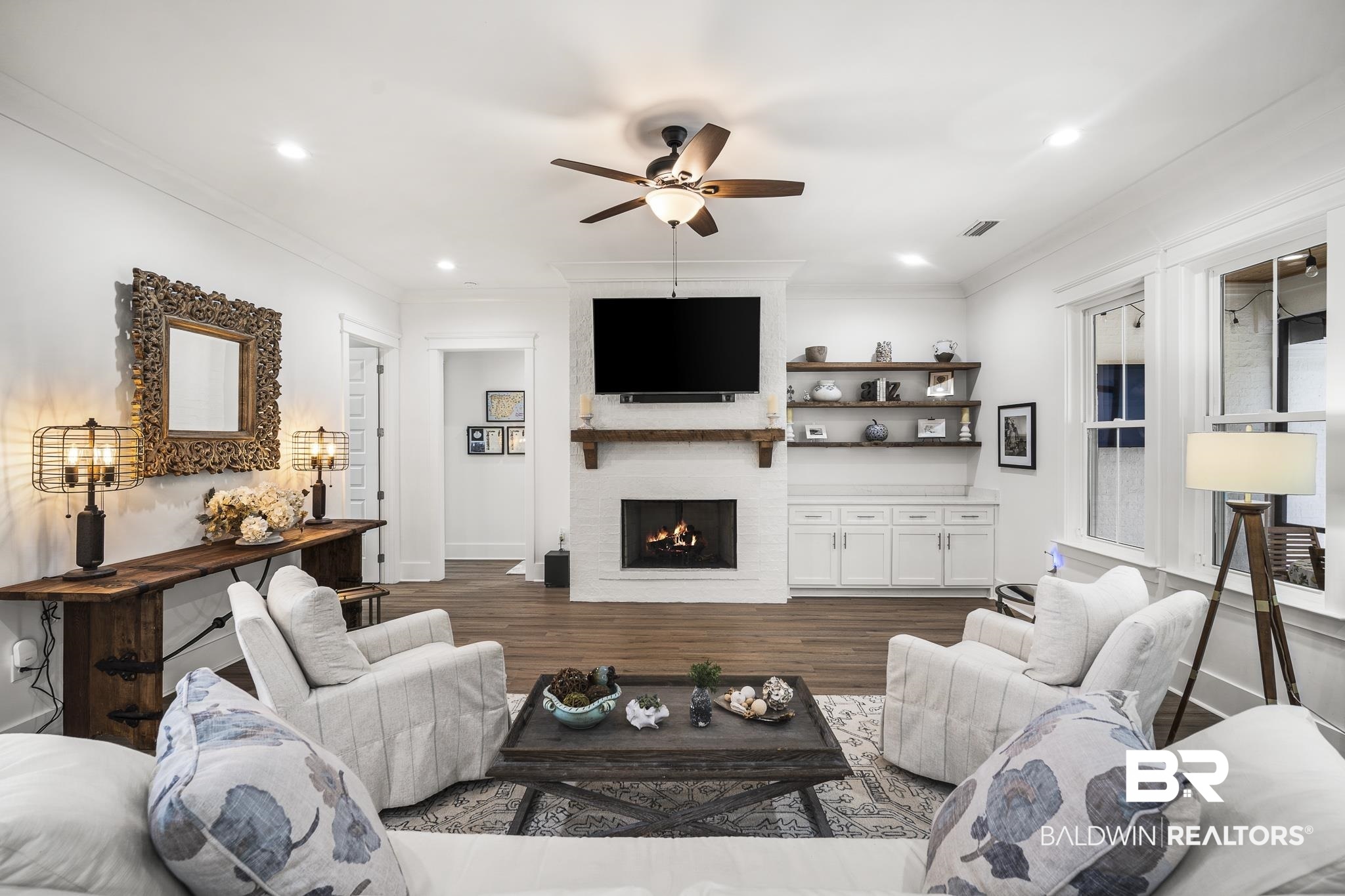 21702 Pillars Street Fairhope, AL 36532 - Photo 7 of 54 Living area featuring recessed lighting, a ceiling fan, and wood-finish flooring