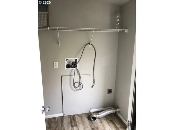 a view of a room with rack on the wall