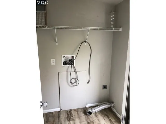 a view of a room with rack on the wall