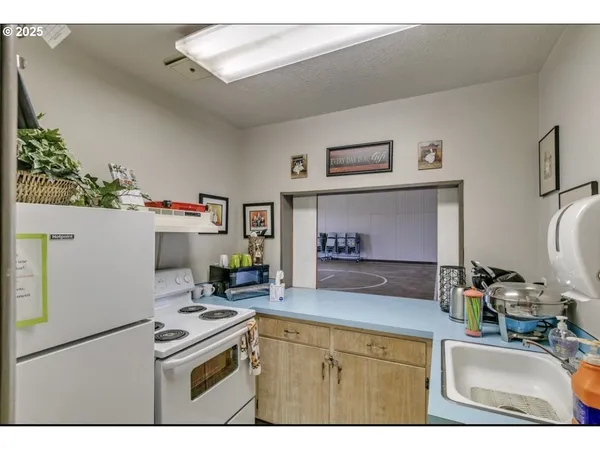 a bedroom with a bed and a table in it