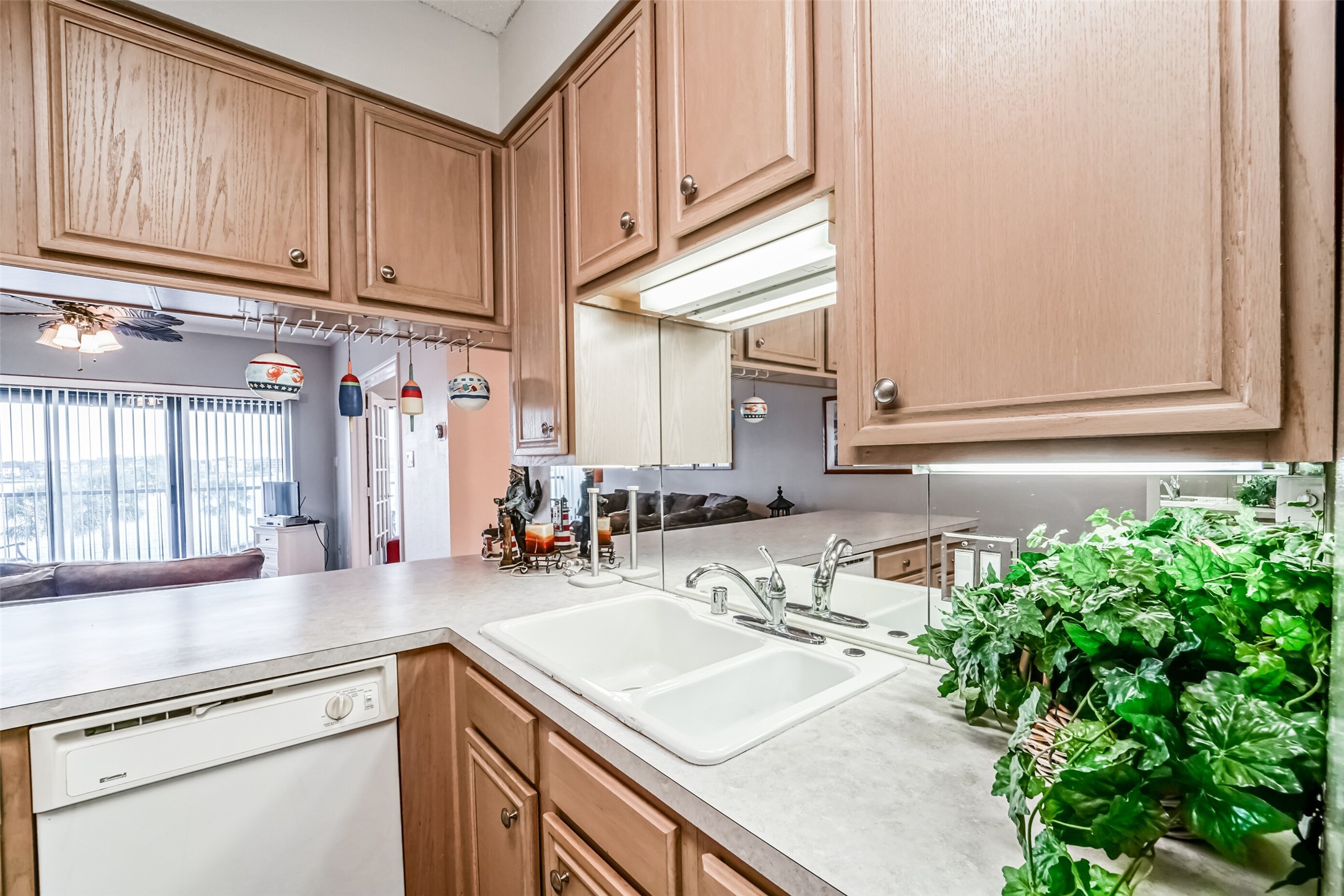 351 Lakeside Lane, Unit 209 Houston, TX 77058 - Photo 12 of 37 a bathroom with a sink and a mirror
