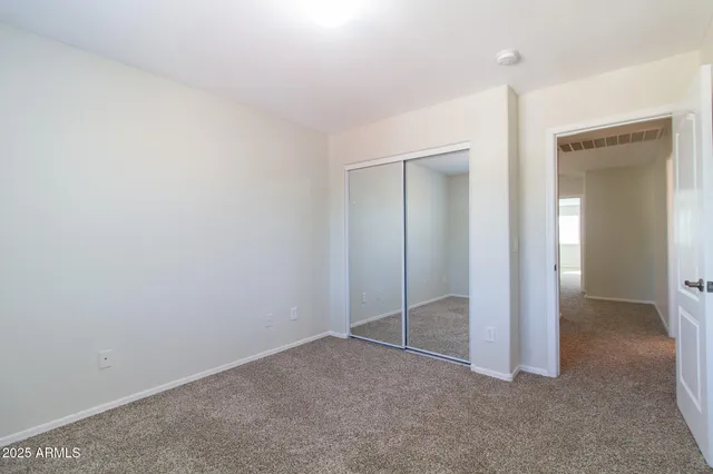 an empty room with closet