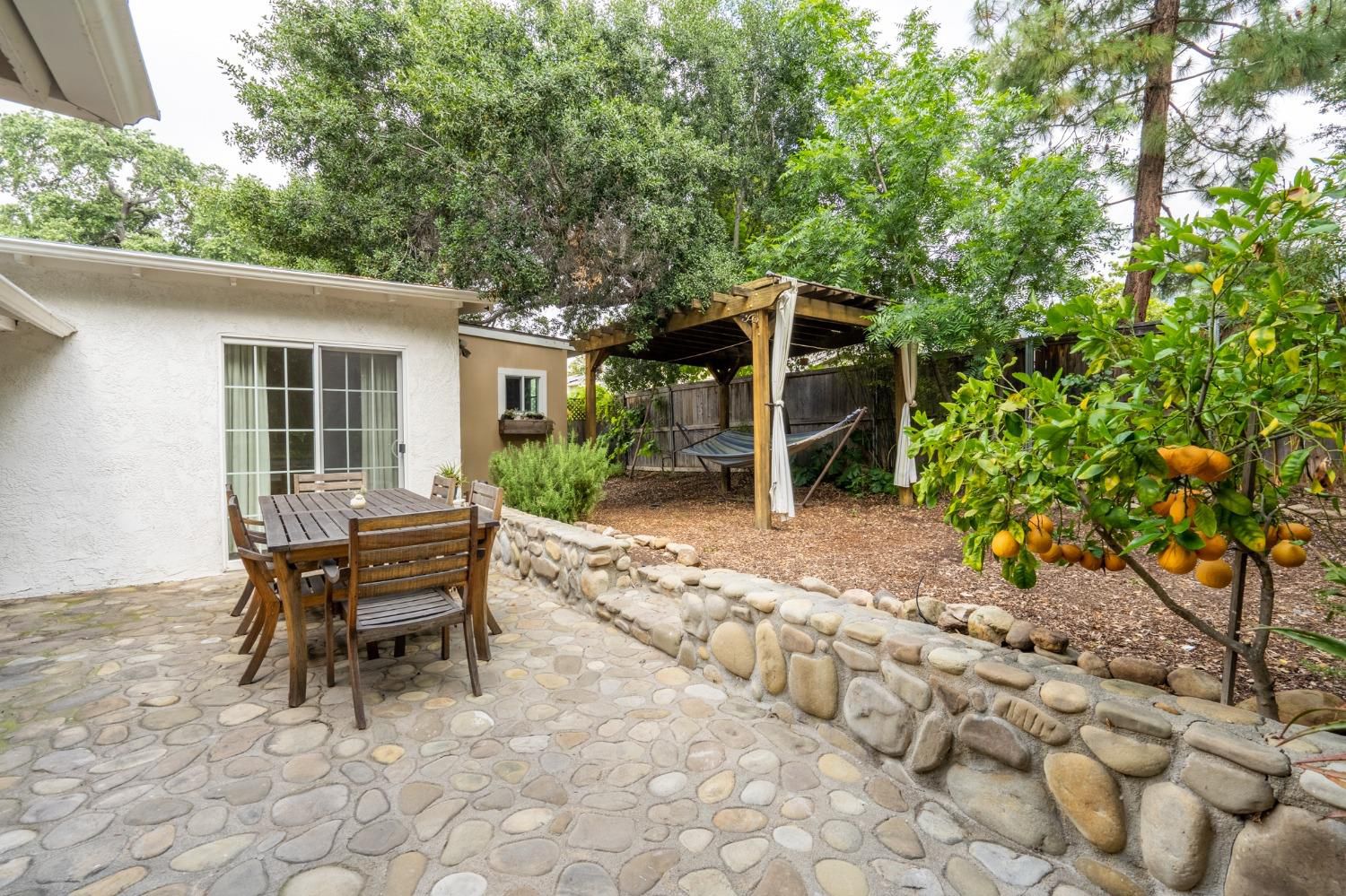 412 Franklin Drive Ojai, CA 93023 - Photo 2 of 50 a backyard of a house with table and chairs