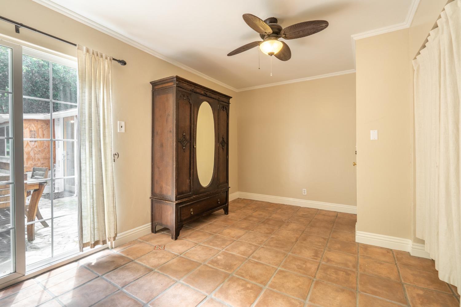 412 Franklin Drive Ojai, CA 93023 - Photo 37 of 50 a view of a hallway with a chandelier fan and windows