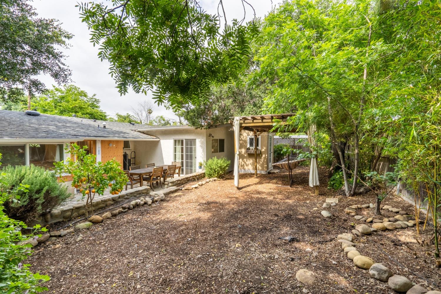 412 Franklin Drive Ojai, CA 93023 - Photo 42 of 50 front view of a house with a big yard and potted plants