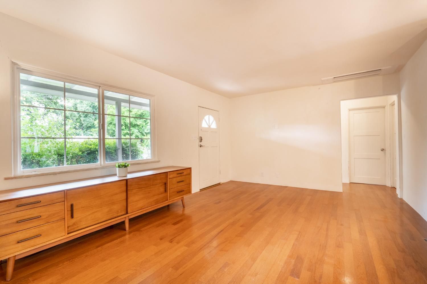 412 Franklin Drive Ojai, CA 93023 - Photo 7 of 50 wooden floor in an empty room with a window
