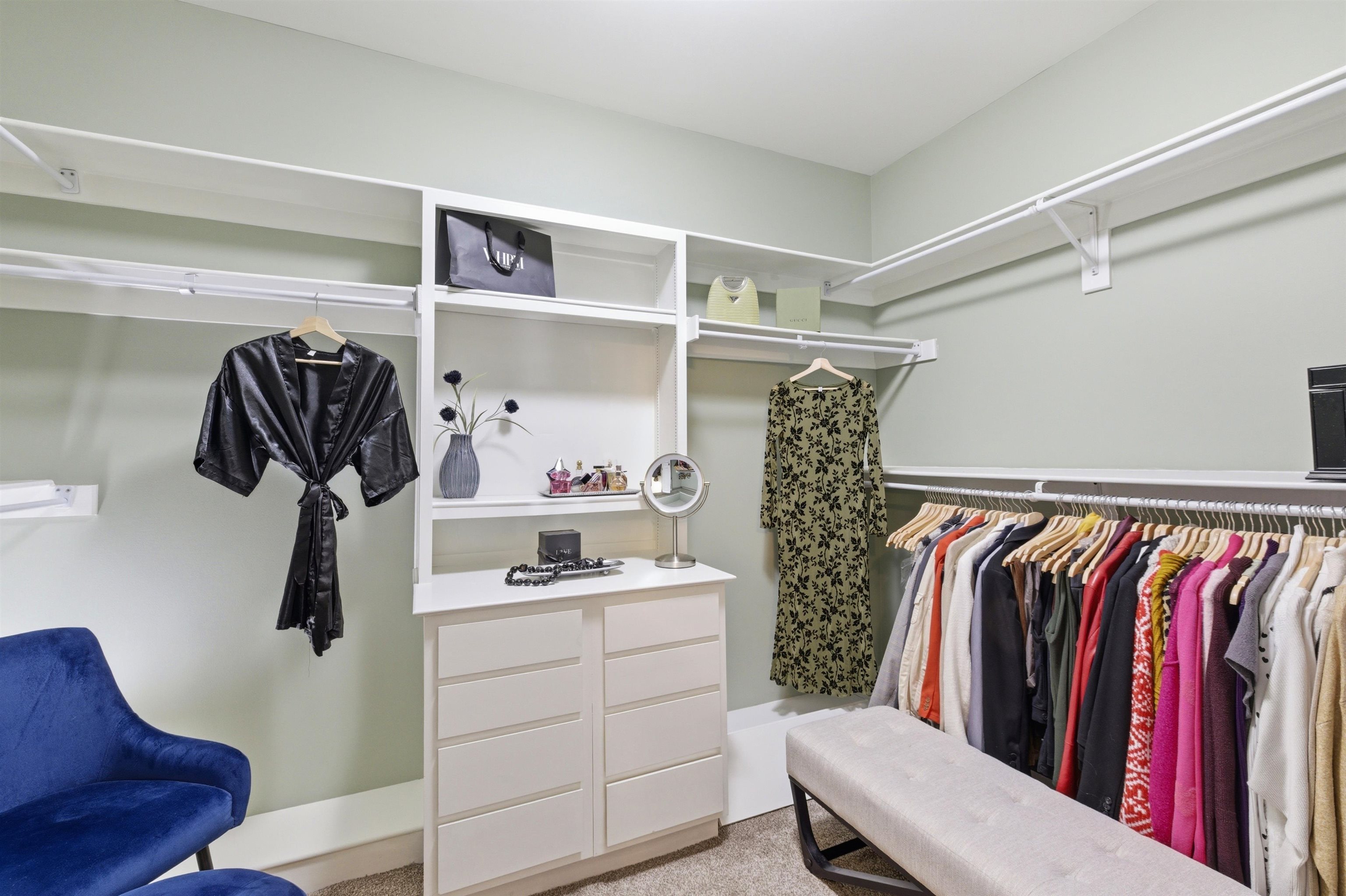 5956 Windsor Falls Loop Arlington, TN 38002 - Photo 22 of 40 a view of walk in closet with clothes and shoes