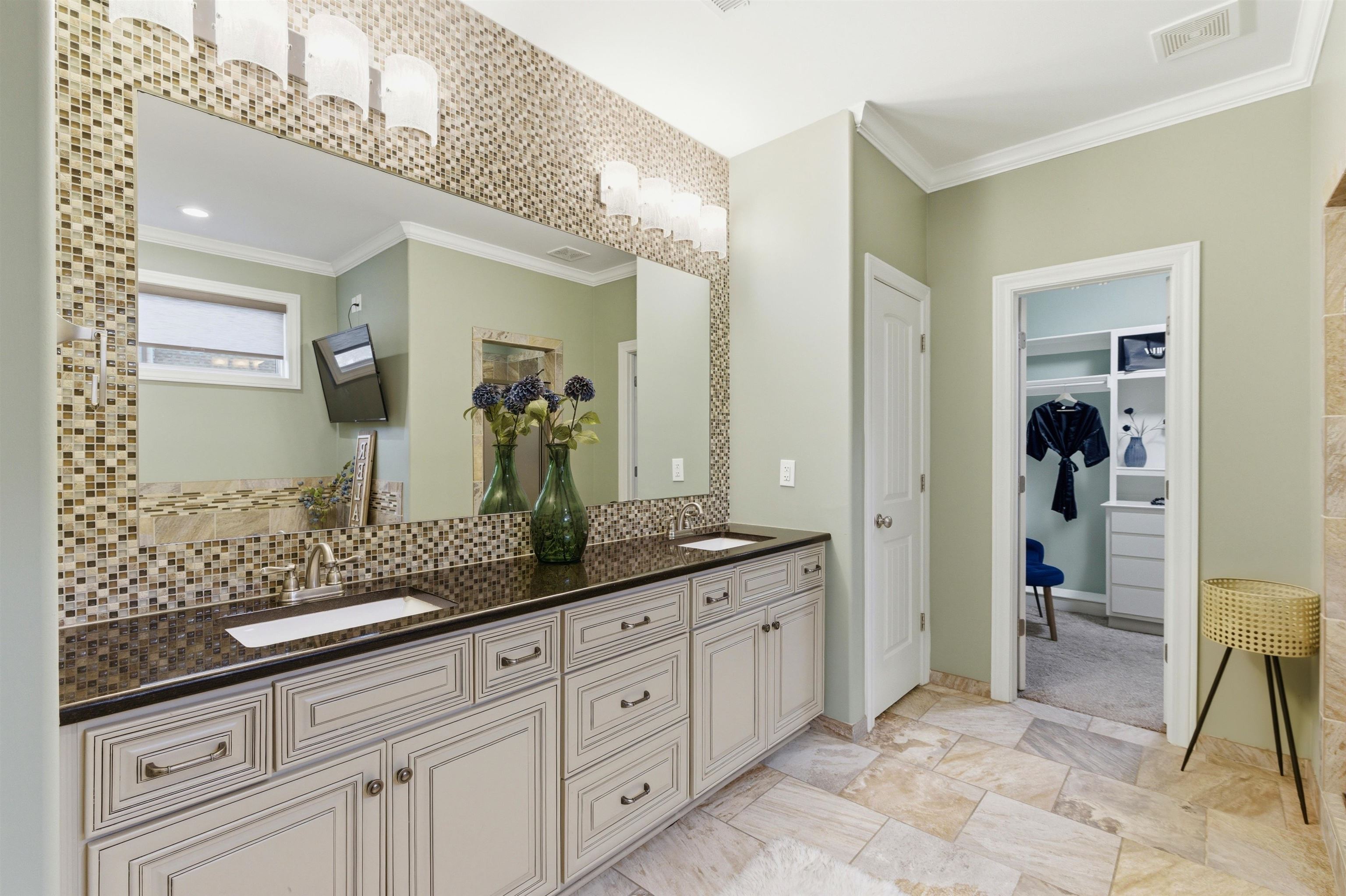 5956 Windsor Falls Loop Arlington, TN 38002 - Photo 23 of 40 a spacious bathroom with a granite countertop sink and a mirror