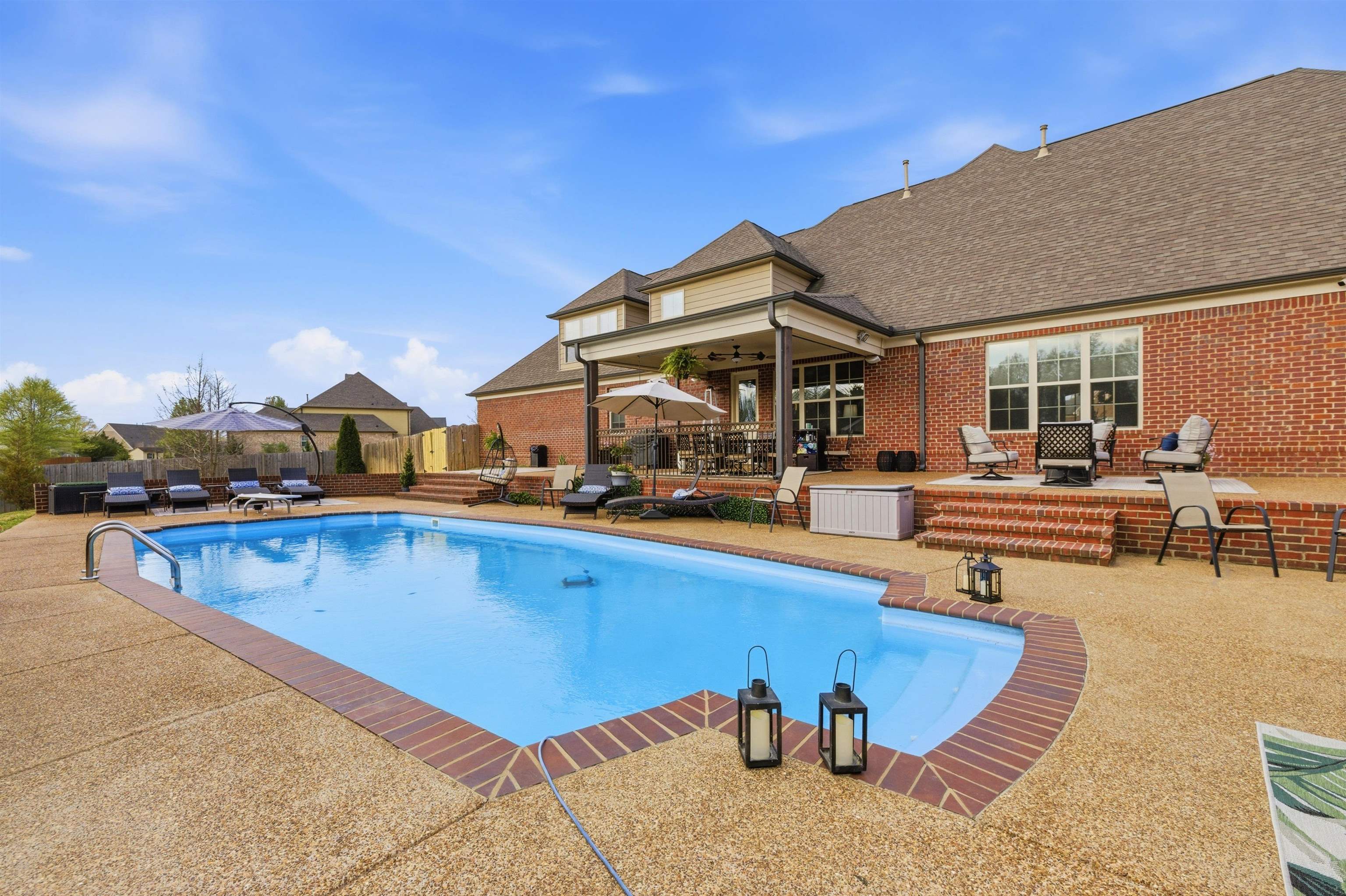 5956 Windsor Falls Loop Arlington, TN 38002 - Photo 39 of 40 a view of a swimming pool with chairs
