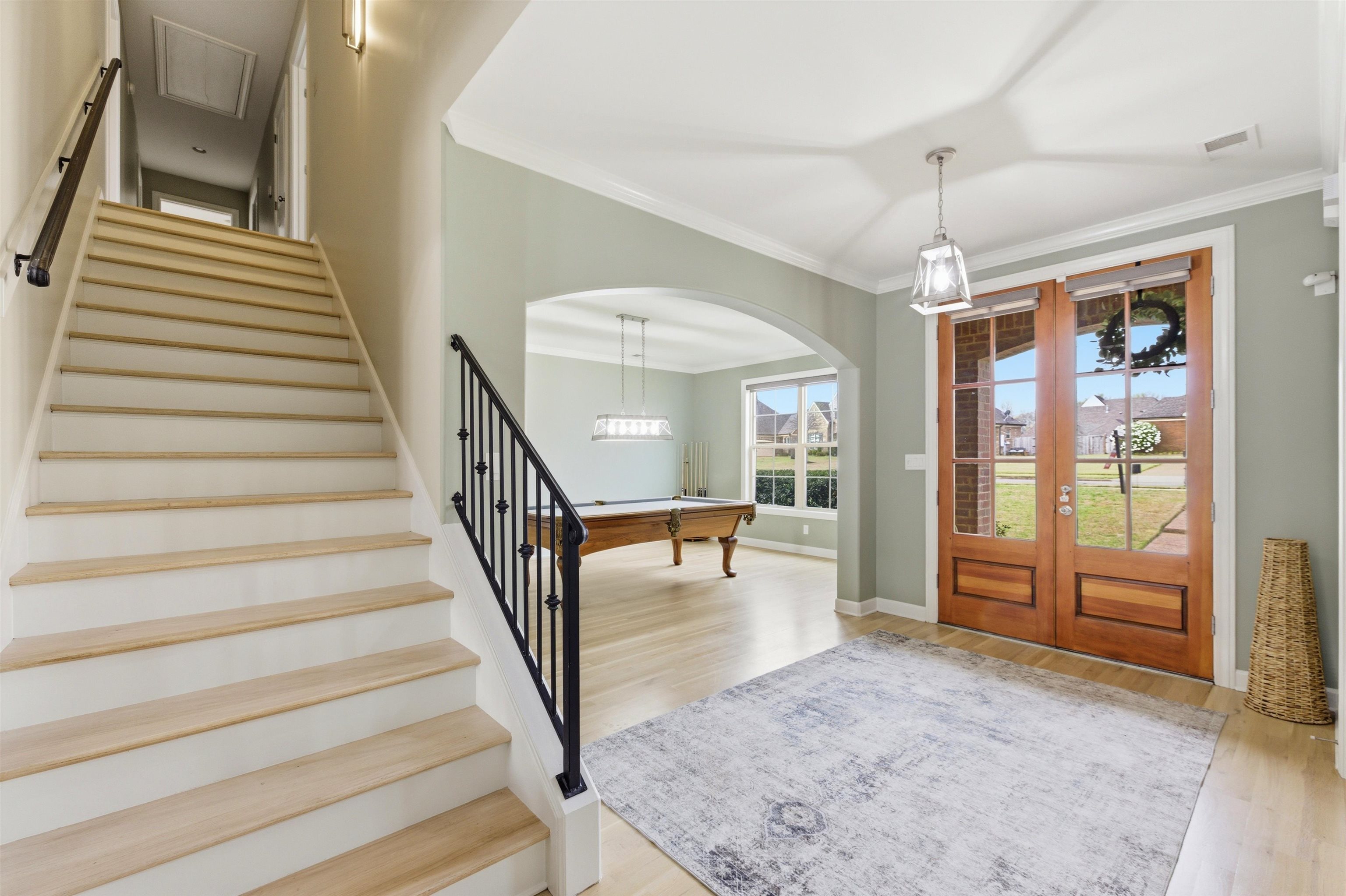 5956 Windsor Falls Loop Arlington, TN 38002 - Photo 4 of 40 a view of staircase with a rug floor and a floor to ceiling window