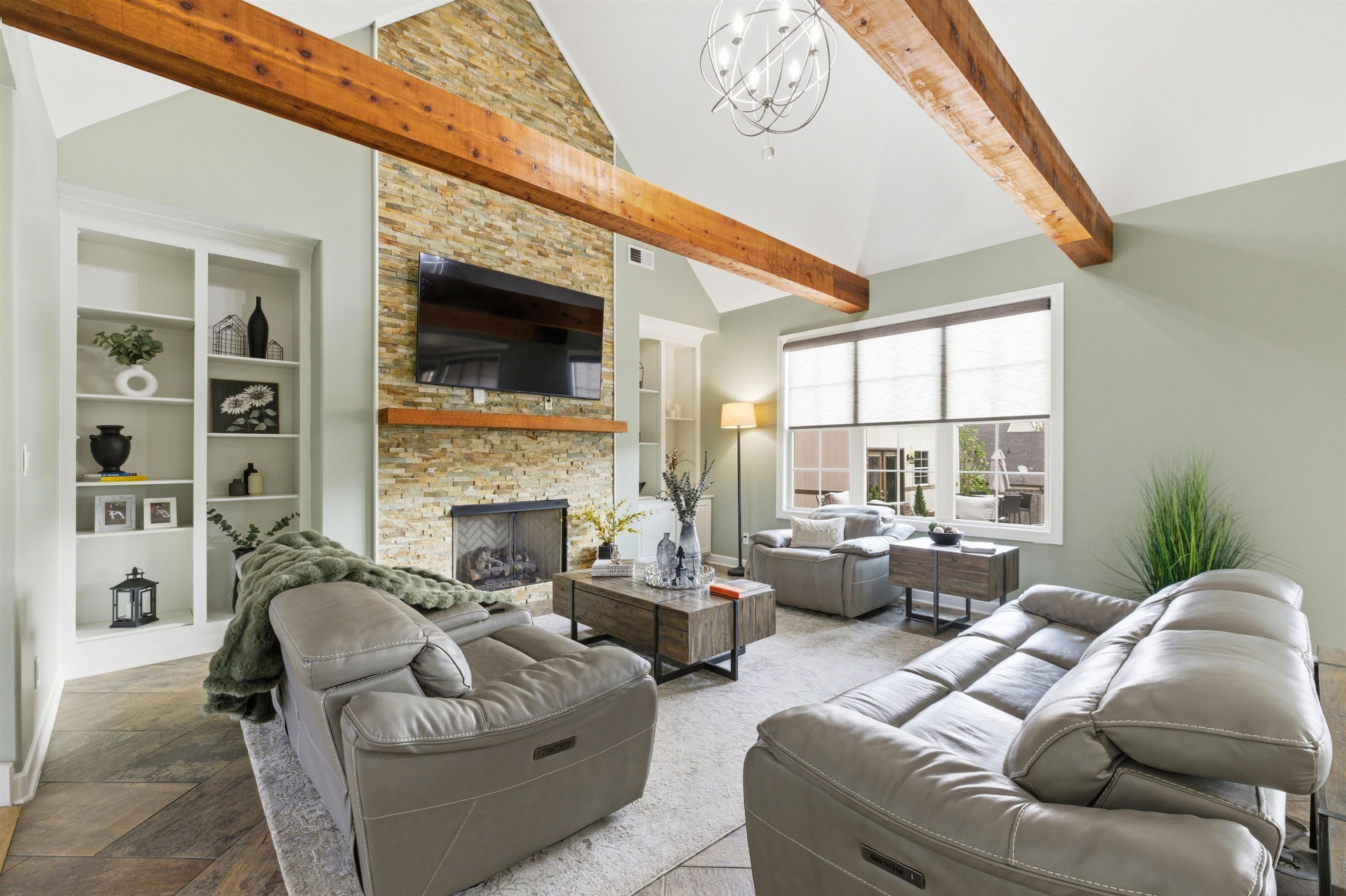 5956 Windsor Falls Loop Arlington, TN 38002 - Photo 5 of 40 a living room with furniture and a fireplace