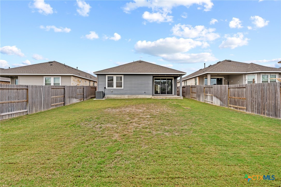448 Chaste Tree Drive San Marcos, TX 78666 - Photo 29 of 31 a view of a house with a yard and sitting area