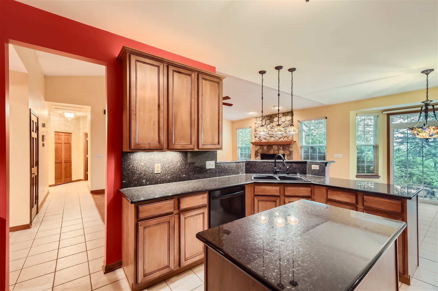 949 Carmen Road Sugar Grove, IL 60554 - Photo 4 of 26 a kitchen with stainless steel appliances granite countertop sink stove and cabinets