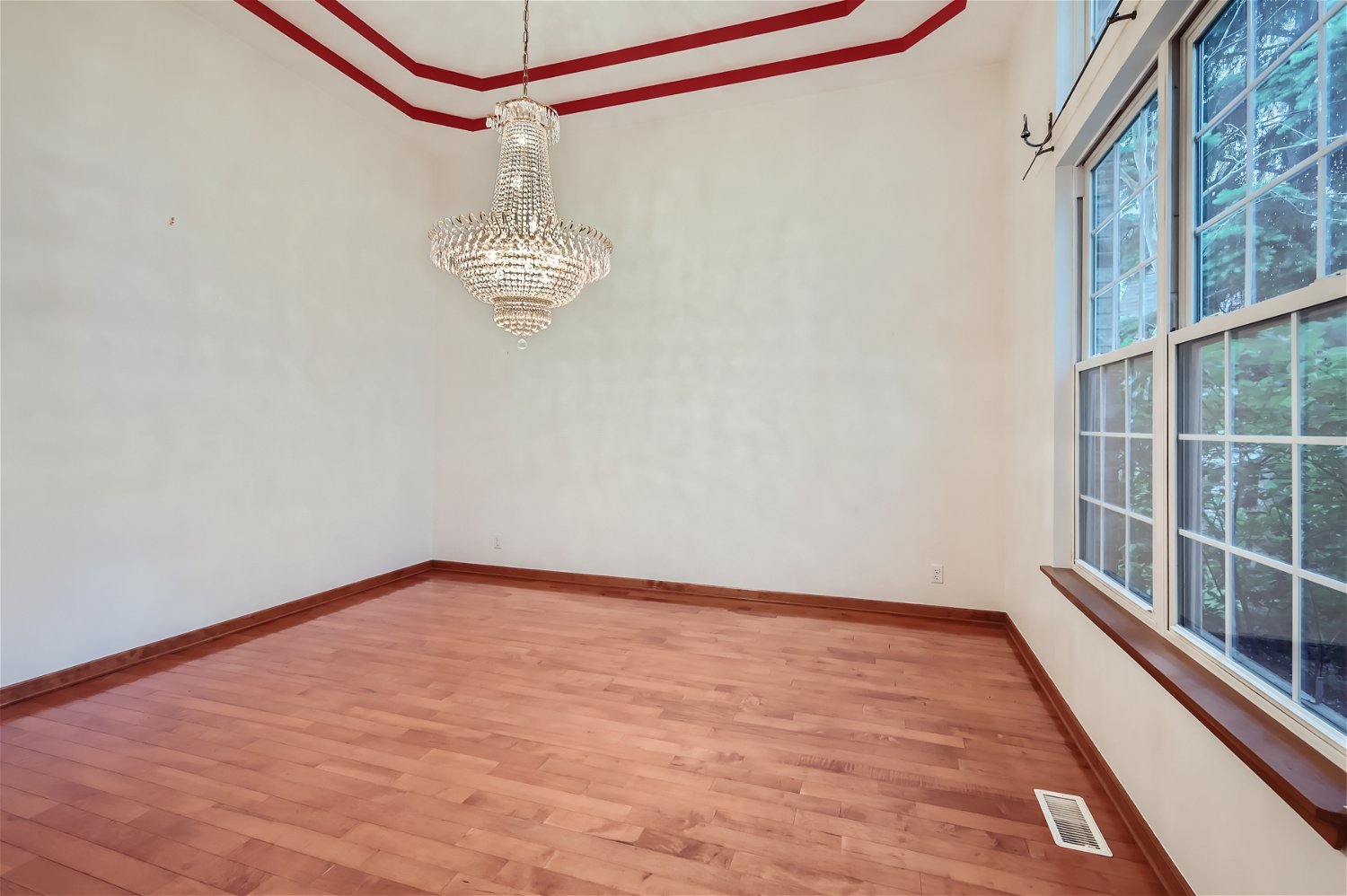 949 Carmen Road Sugar Grove, IL 60554 - Photo 9 of 26 a view of a room with wooden floor and white walls