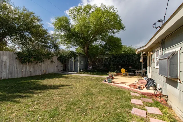 a house view with a garden space
