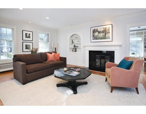 121 Intervale Road Newton, MA 02467 - Photo 4 of 14 a living room with furniture and a fireplace