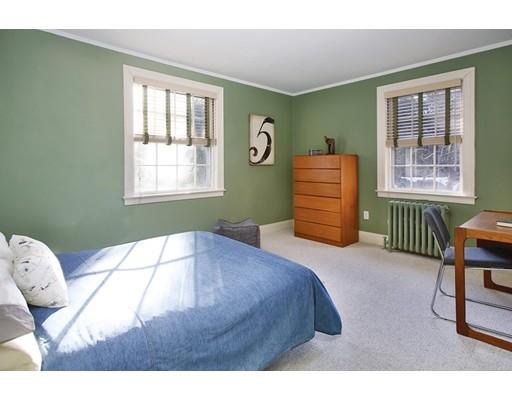 121 Intervale Road Newton, MA 02467 - Photo 10 of 14 a bedroom with a bed and a window in it