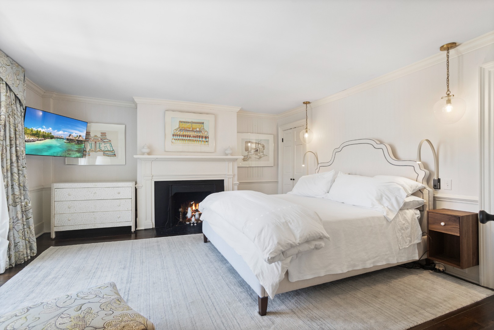 19 Orange Street Nantucket, MA 02554 - Photo 33 of 85 a bedroom with a bed and a fireplace