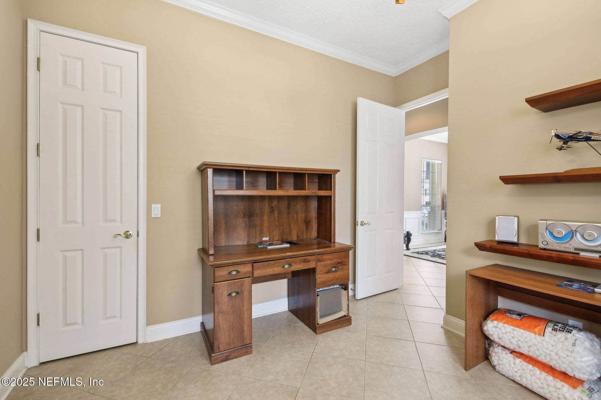 400 Central Street St. Augustine, FL 32095 - Photo 21 of 49 a kitchen with stainless steel appliances a stove and a microwave